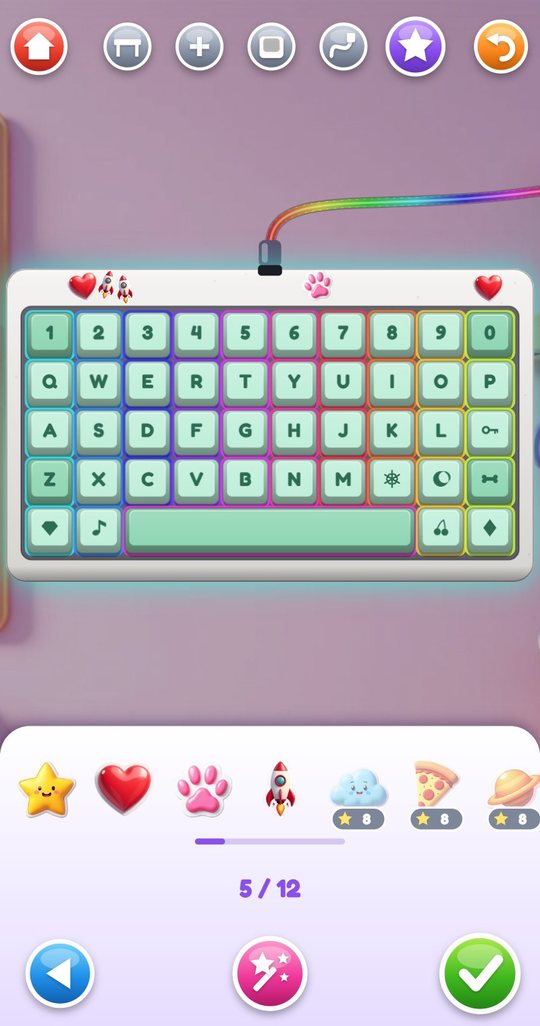 The sticker step: a mint keyboard with a rainbow cable and glowing keys, hearts, rockets and a paw stuck on the case, and a counter showing 5 of 12 stickers